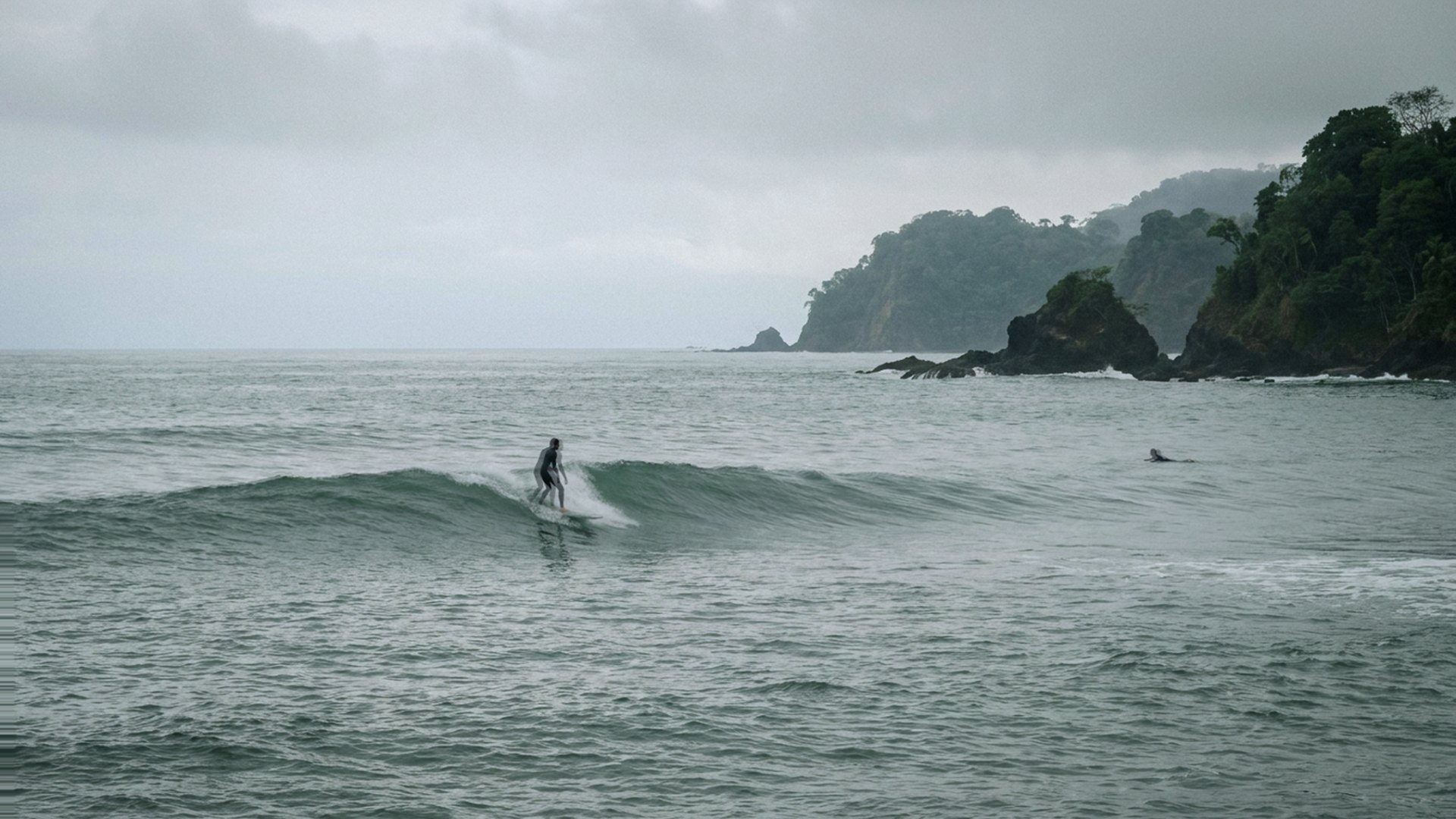 Surfer riding an ocean wave